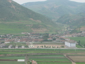 Barren and eroded hillsides in Namyang, North Hamgyong Province, as seen from Tumen City in China, June 2016. On the Chinese side, the equivalent hills are covered with trees. Photograph by Benjamin Katzeff Silberstein