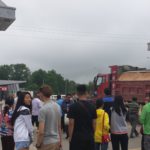 Tourists and truck at Rason crossing from Hunchun